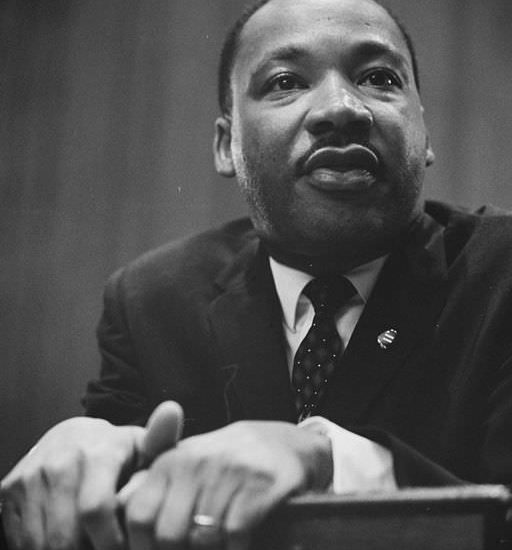 jan18_Martin-Luther-King-1964-leaning-on-a-lectern