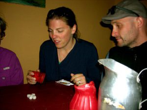 Annemarie's brother and sister-in-law playing cacho.