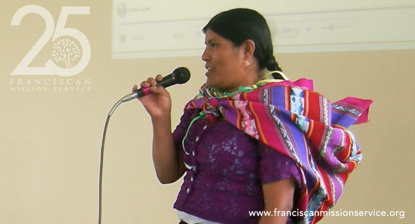 Bolivian woman on mic
