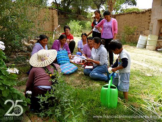 Brief group meeting with the women from Santa Rosa in the parish garden