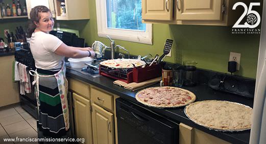 Fellow missioner Allison working on homemade pizzas for dinner