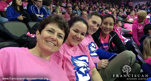 Reminders of home - Allison's mom and family friends at a Creighton Basketball game